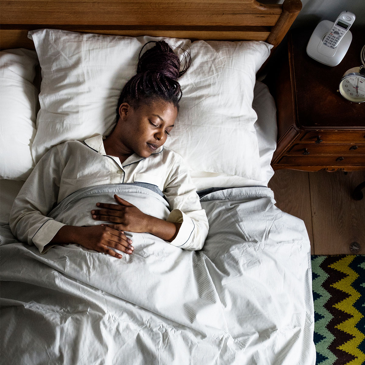 woman sleeping peacefully in bed