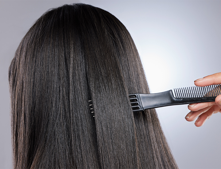 Woman with thick hair.