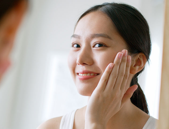 woman-smiling-at-skin