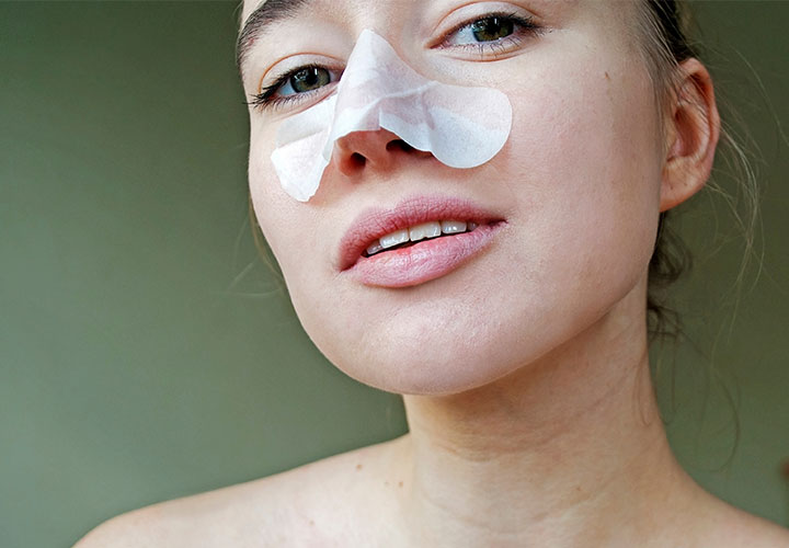 woman-using-blackhead-pore-strip