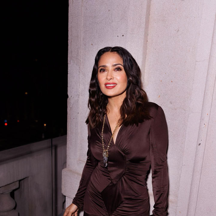 Salma Hayek in brown YSL dress.