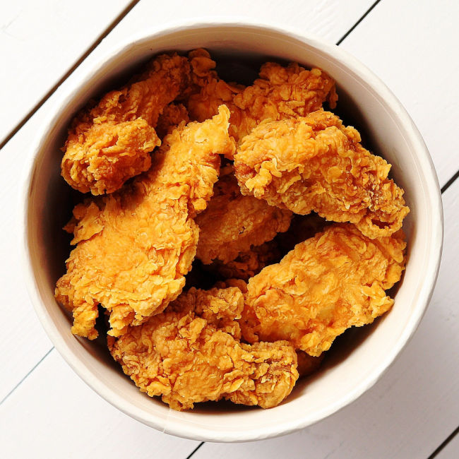 overhead view of bucket of fried chicken