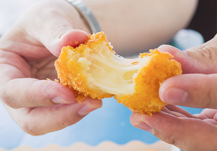 Stretched fried cheese curds.