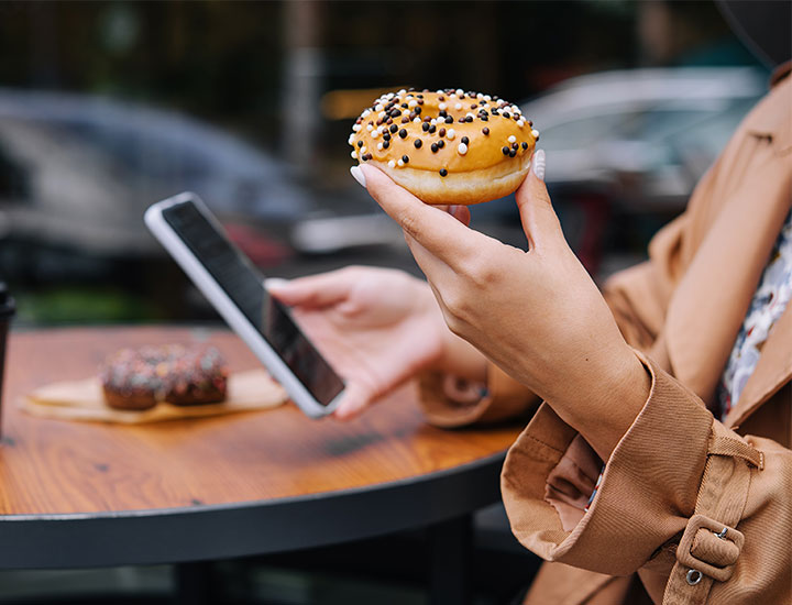 Woman eating a donut