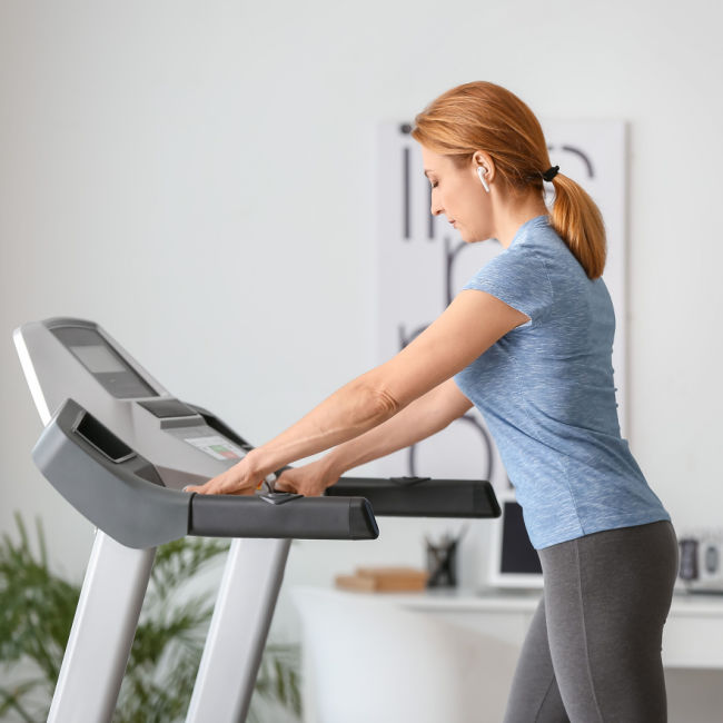 woman walking on treadmill