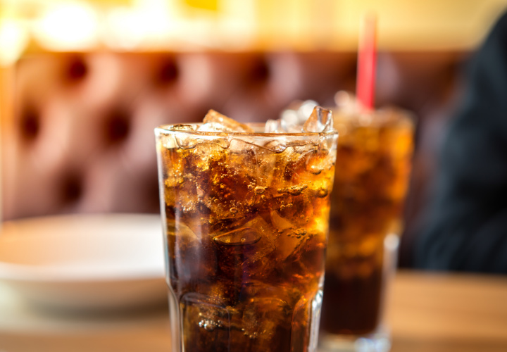 Cups of soda on a table