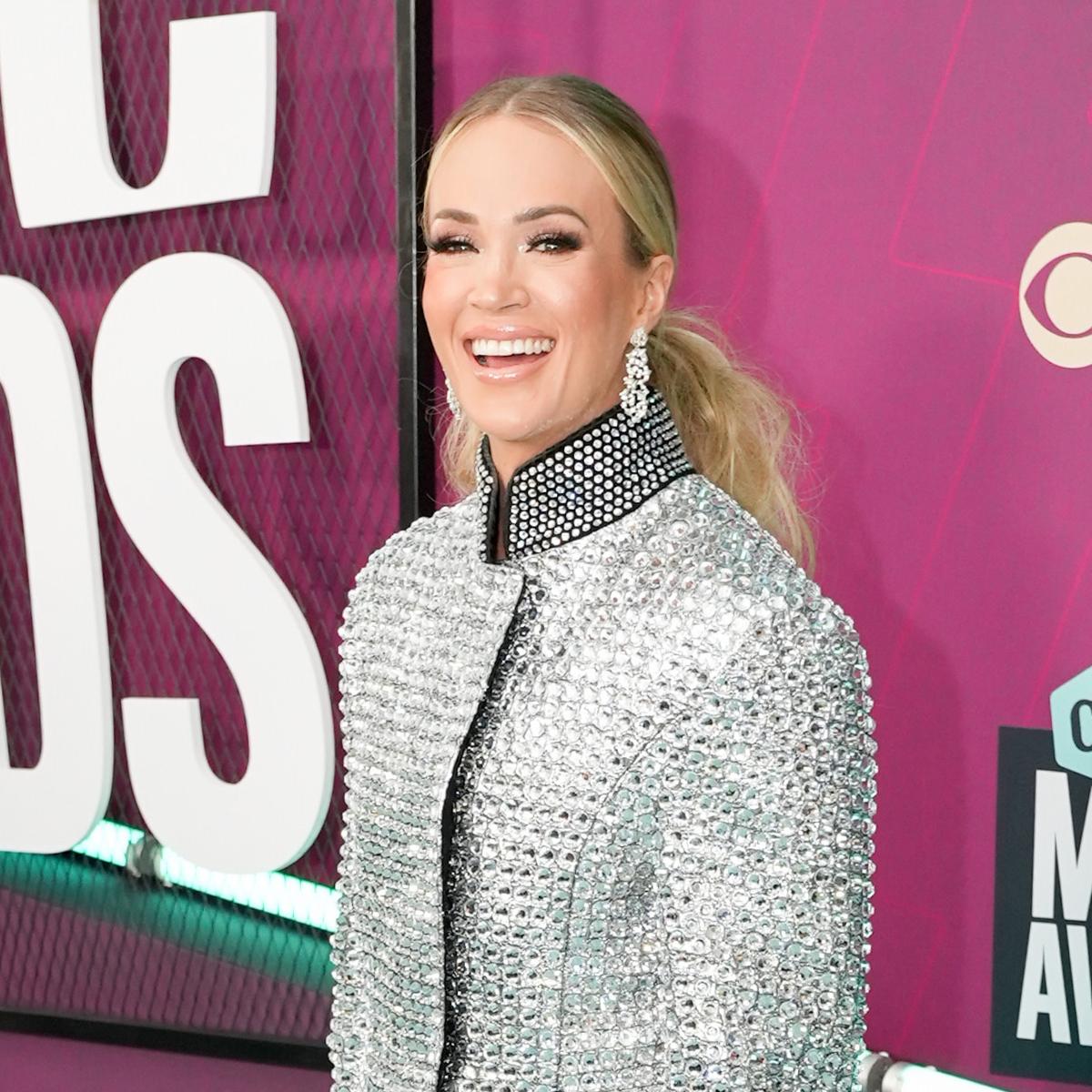 Carrie Underwood Stuns on the 2022 ACM Awards' Red Carpet in Mini Dress
