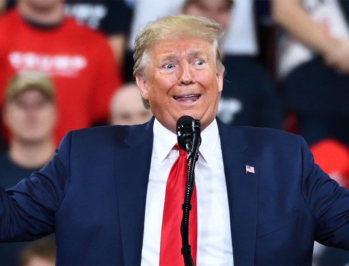 donald trump red tie speaking orange skin yellow hair public event rally