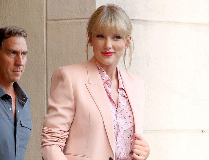 Taylor Swift outside Stonewall Inn in NYC pink jacket 2019