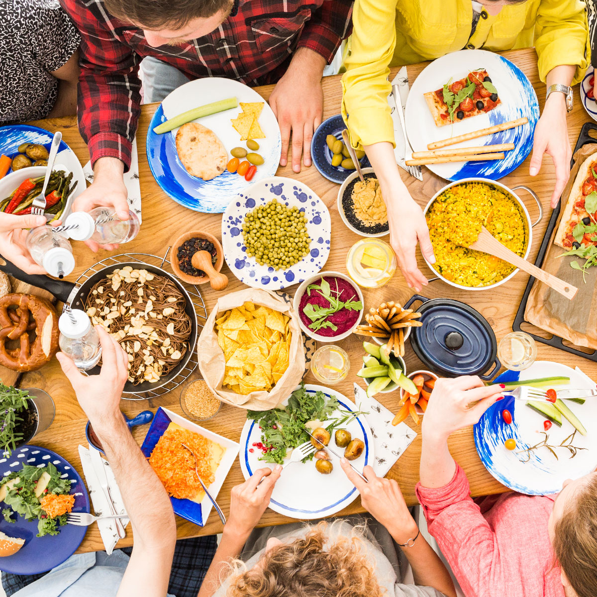 https://www.shefinds.com/files/2023/04/group-of-friends-sharing-a-healthy-meal.jpg