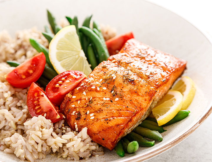 Salmon dinner with rice and vegetables