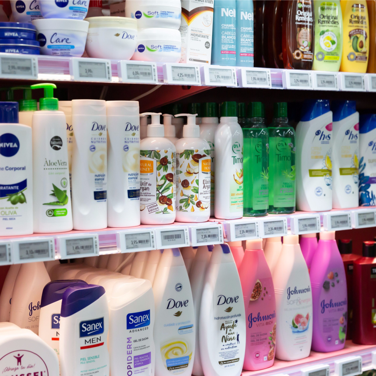 bottles of multicolored store shampoo products on shelf