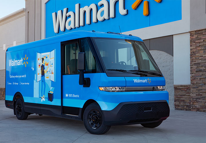 Walmart delivery truck in front of Walmart store