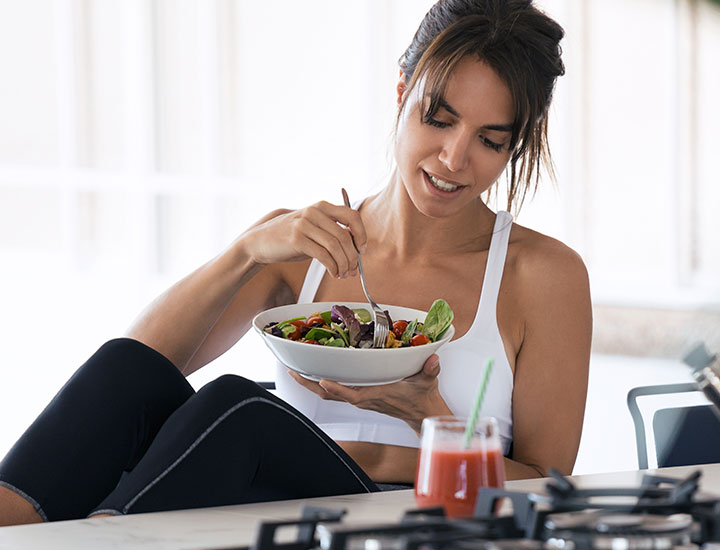 Woman eating a salad