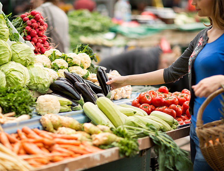 Woman shopping for vegetables