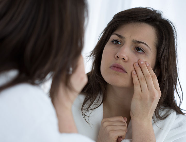 woman-worried-under-eye-bags