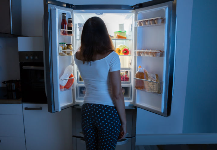 Woman eating late at night