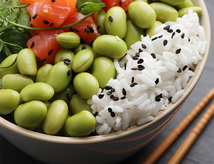 Bowl of rice and edamame with salmon