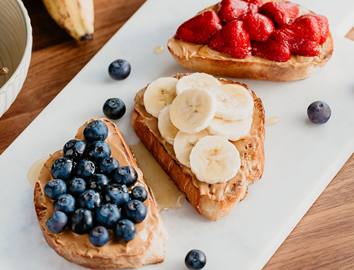 Bananas and berries on toast