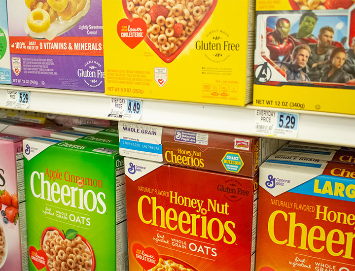 Boxes of Cheerios with refined sugar