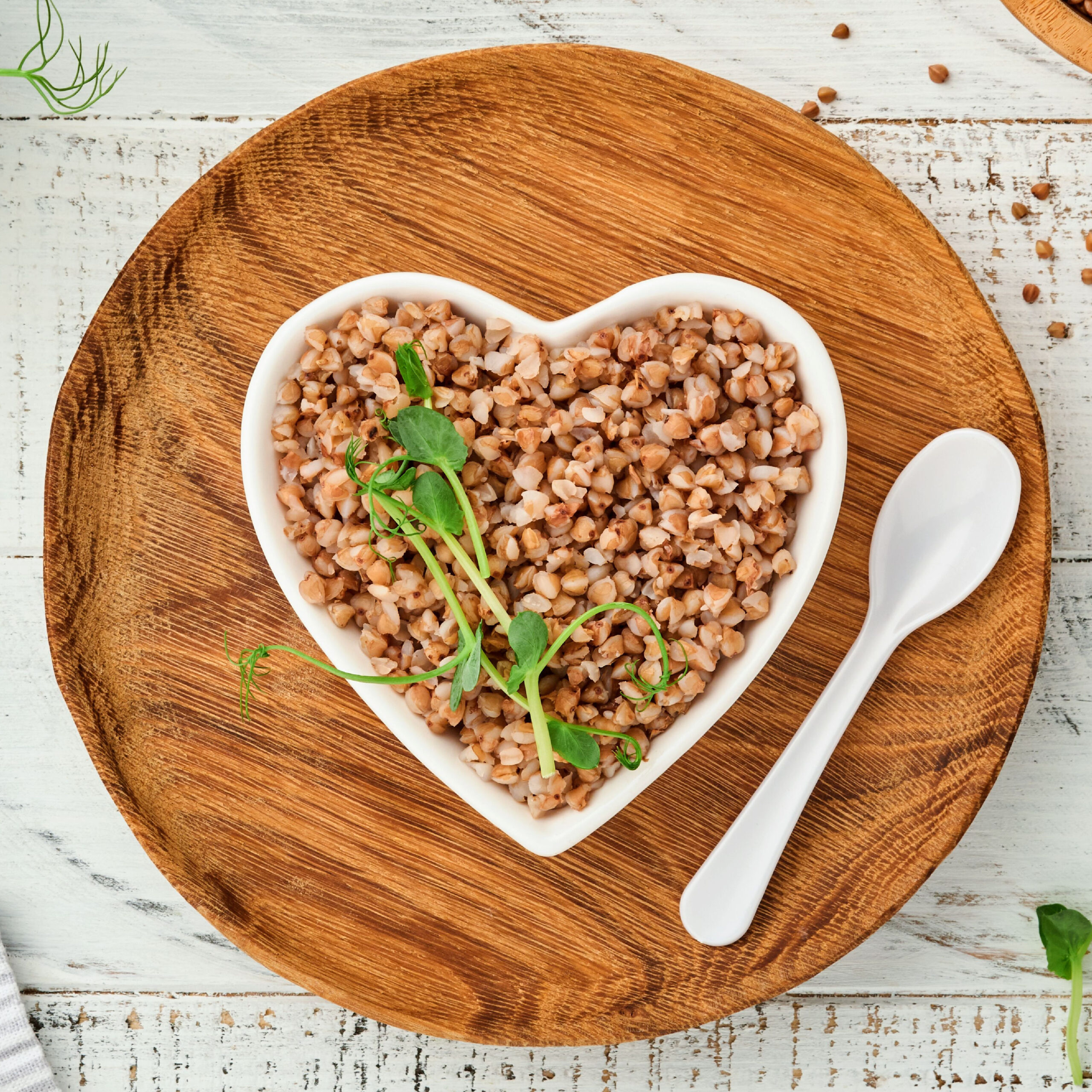 buckwheat in white heart-shaped dish