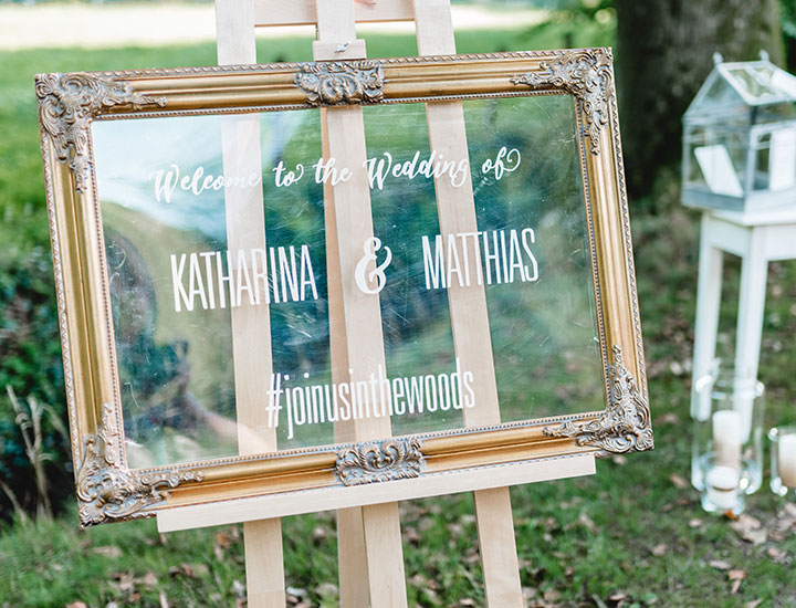 Signage with wedding hashtag