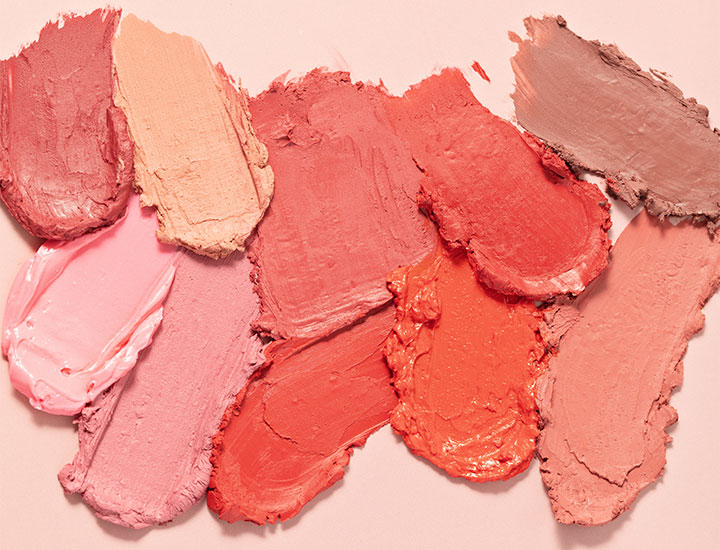 different various cream blushes spread out smudges makeup palette