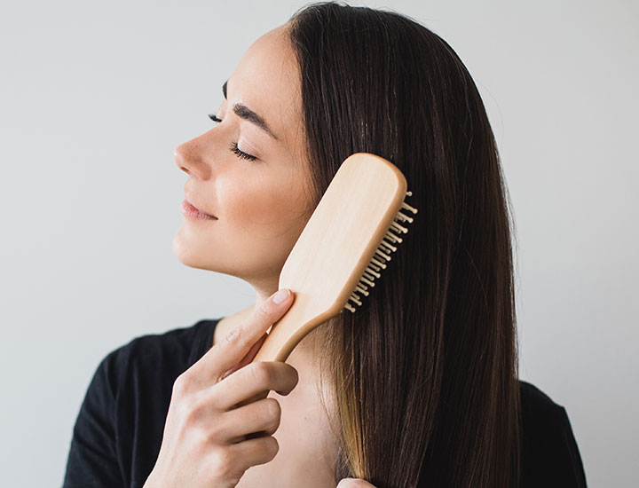 woman-brushing-hair