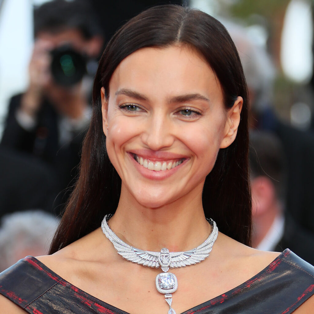 Irina Shayk puts her incredible abs on display in a crop top and