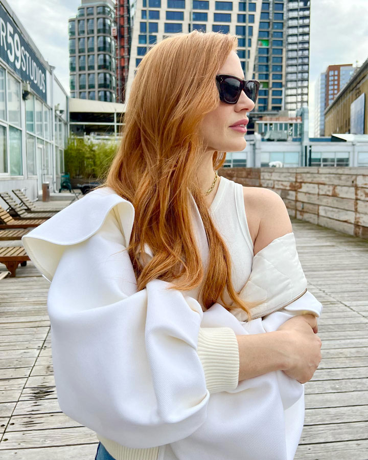 Jessica Chastain white tank top white jacket Instagram