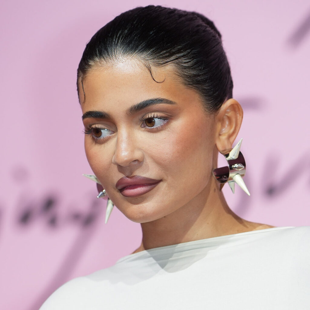 Kylie Jenner Is 'Glowing Like A Queen' In A White Halterneck Dress With A  Corseted Bodice—Fans Are Saying She's 'French Girl Chic!' - SHEfinds