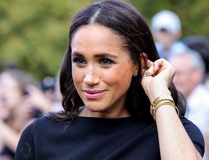 Meghan Markle Wears Chocolate Brown Wraparound Dress to Sushi Date With  Prince Harry