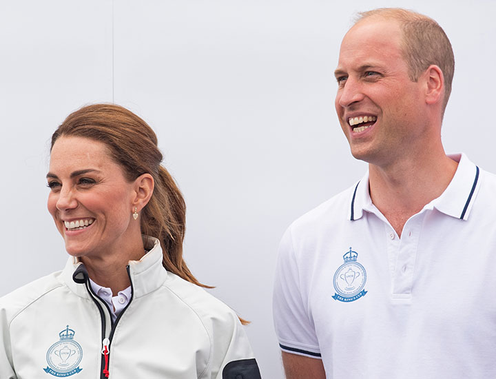 Prince William and Kate Middleton laughing during the inaugural regatta