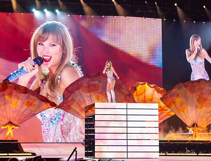 Taylor Swift performing on Eras Tour stage