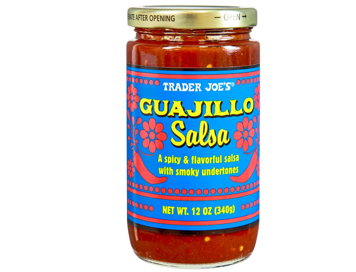 trader joe's guajillo salsa blue and red jar isolated