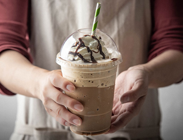 blended coffee drink with whipped cream and syrup