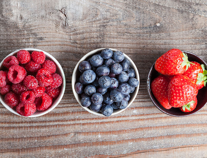 bowls of different varied berries