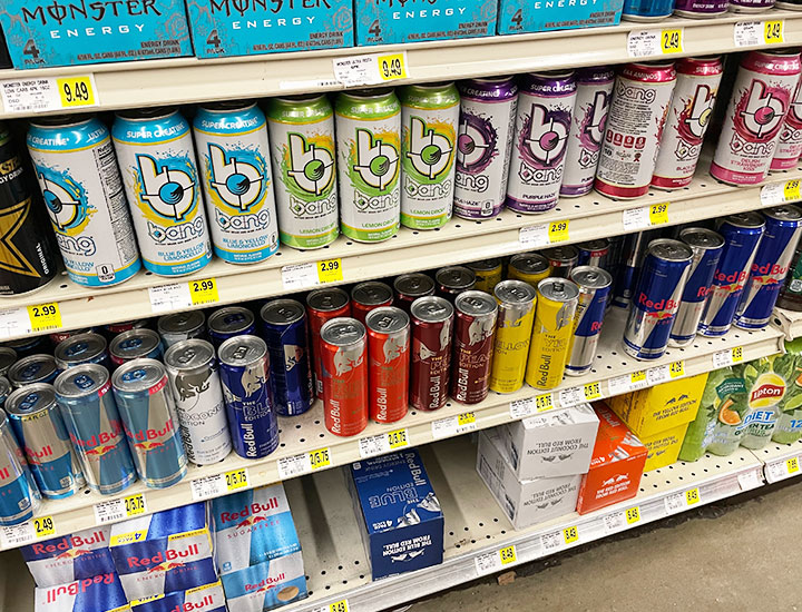 energy drinks canned supermarket store shelves