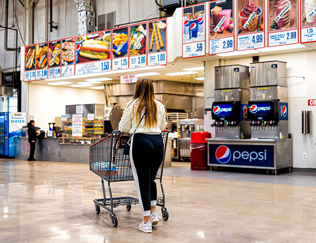 woman walking in costco food court