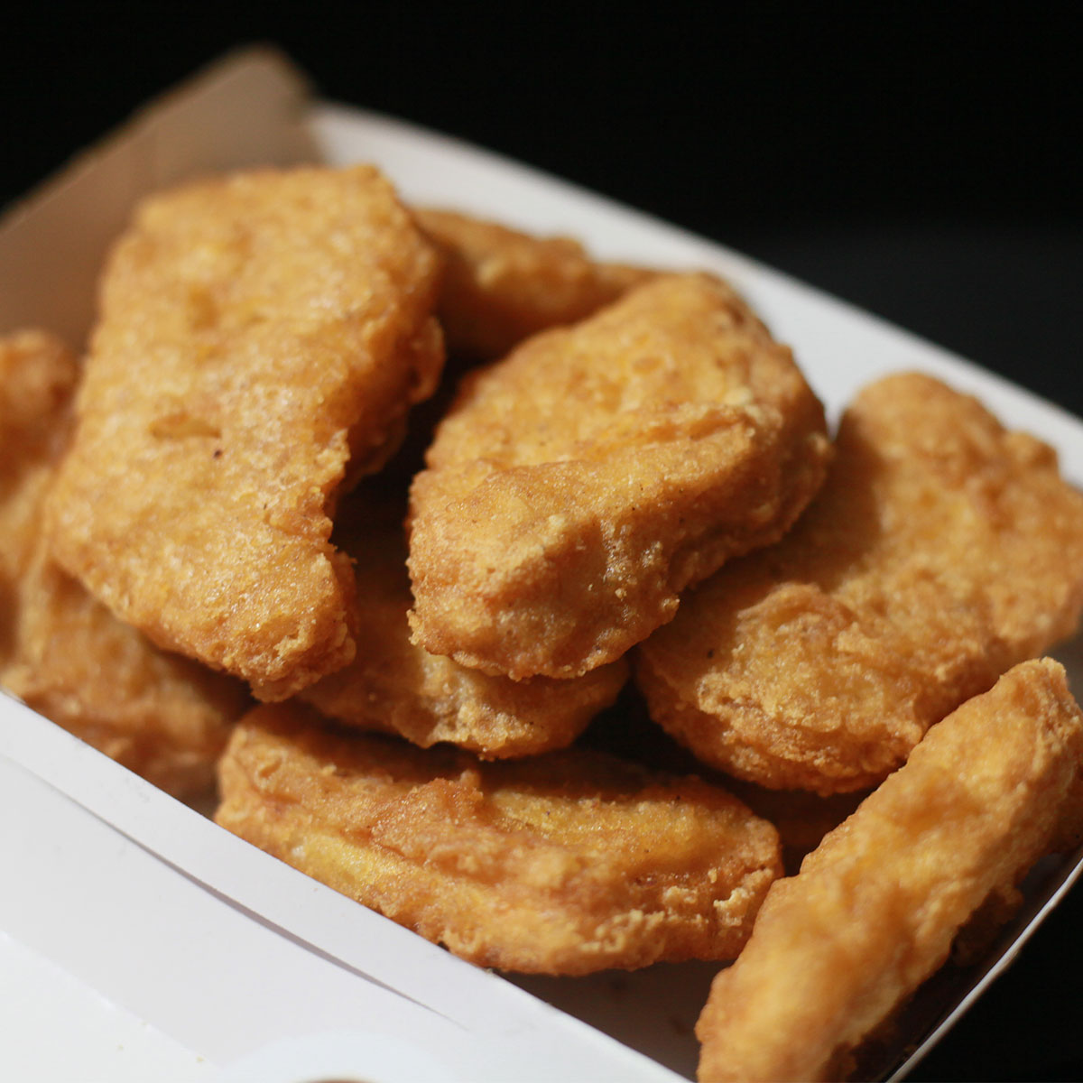 chicken nuggets fast food box isolated