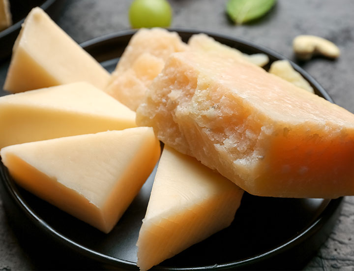 plate of parmesan cheese wedges