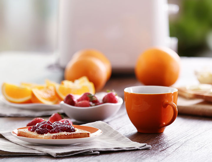 table full of breakfast foods in the morning