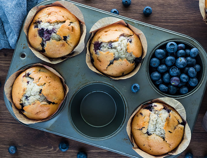 Tin full of blueberry muffins