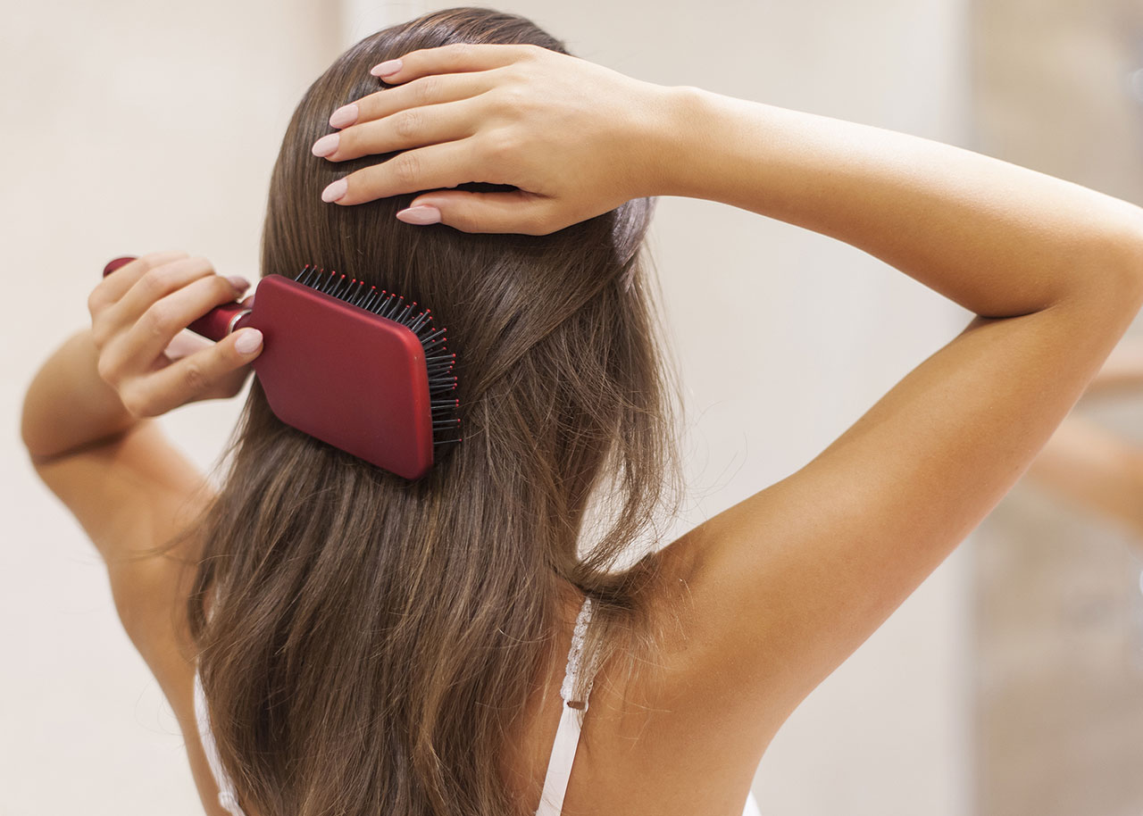 woman-brushing-hair