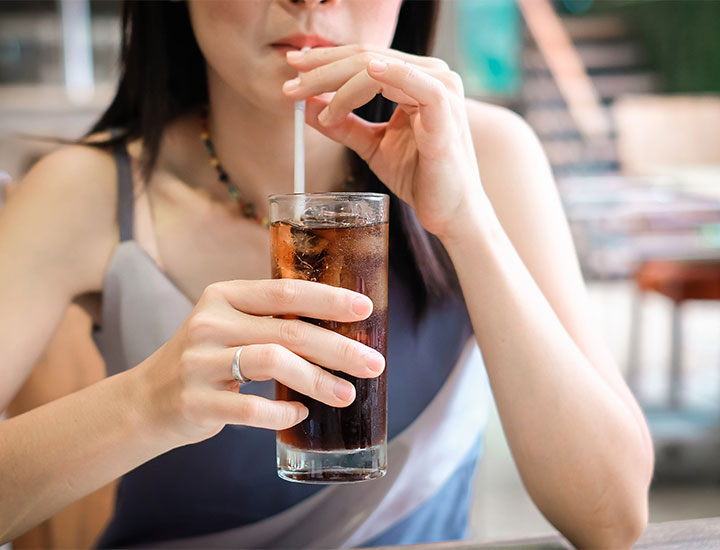 woman-sipping-soda