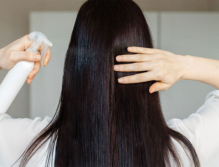 woman-using-texturized-hair-product