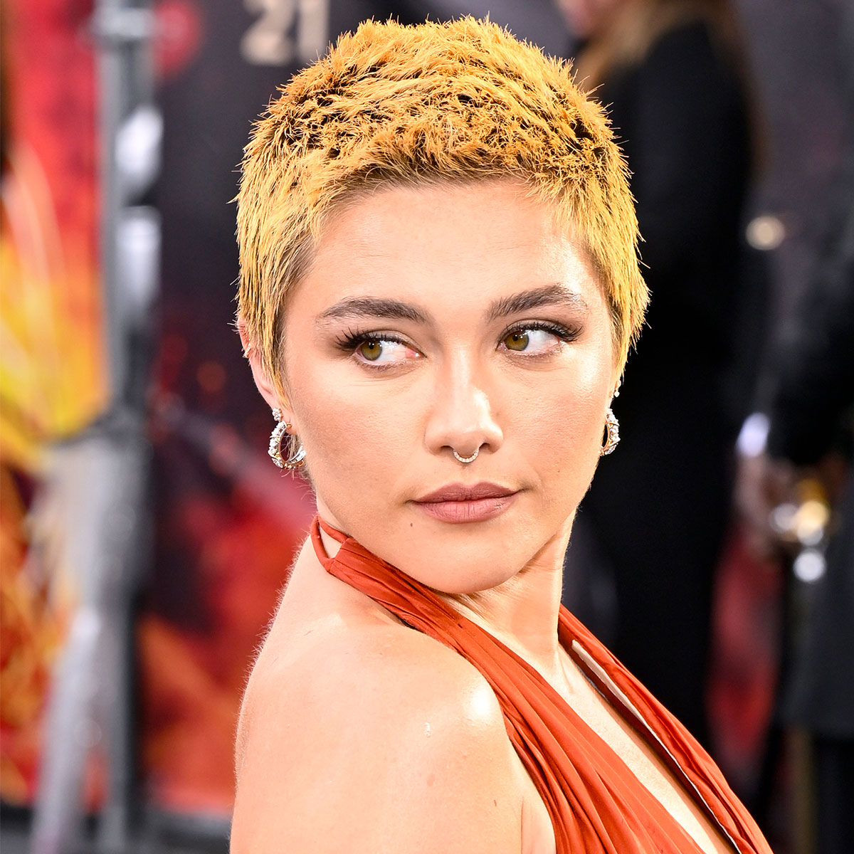 Florence Pugh Pairs Her Pink Pixie Cut With a See-Through Lavender Gown