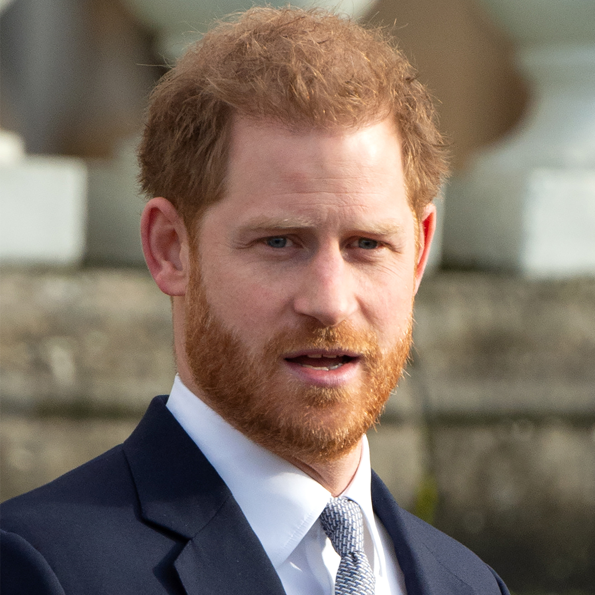 prince harry headshot suit and tie outside