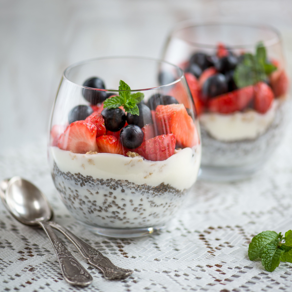 glasses of chia see pudding and fruits