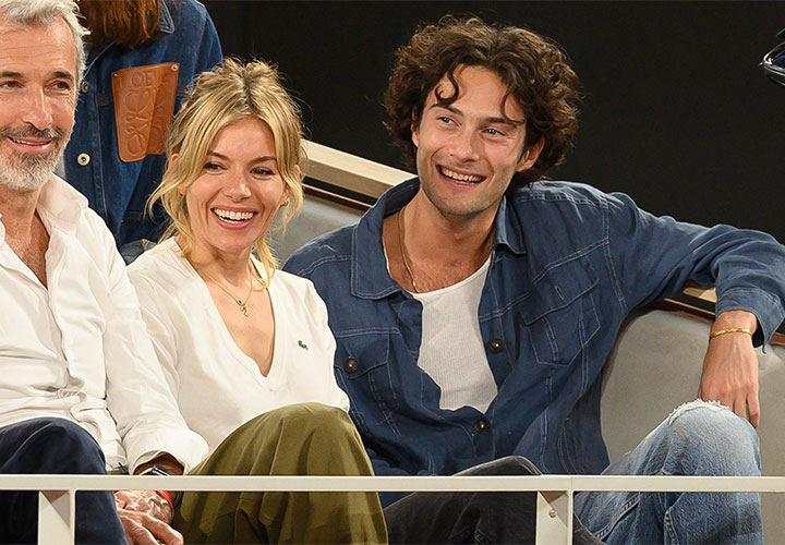 Sienna Miller and Oli Green at the stand during French Open